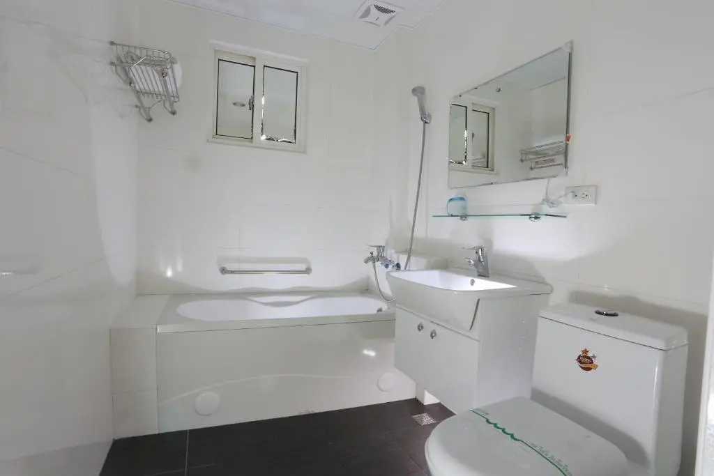 Guo Chen Hotel - Chambres