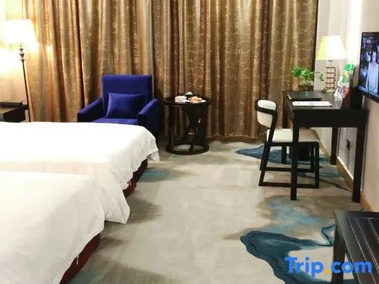 Sanyou International Hotel - Chambres