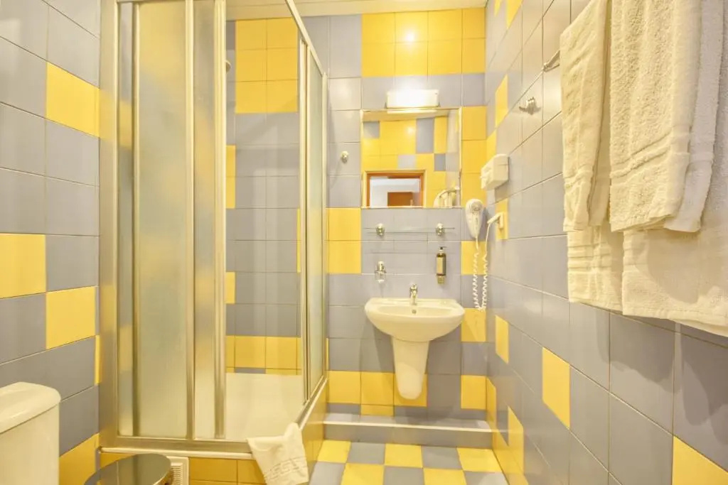 Inza Hotel - Chambres