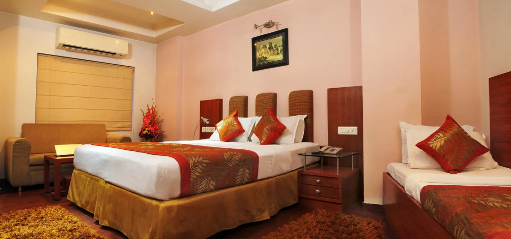 Trimrooms Palm D'or - Chambres