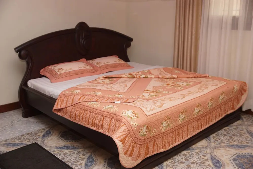 Entebbe Travelle'rs Inn - Chambres