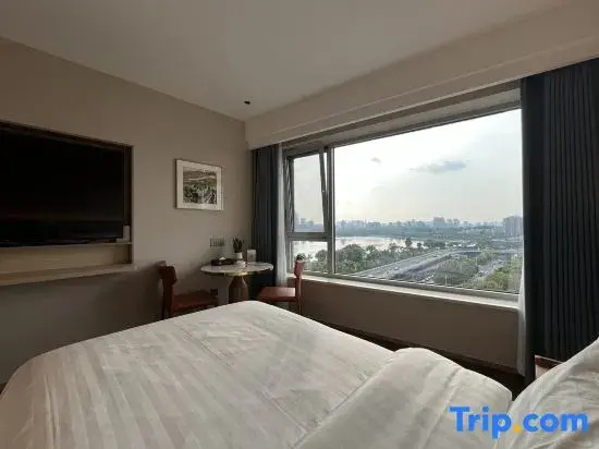 Maochen New Century Hotel - Chambres