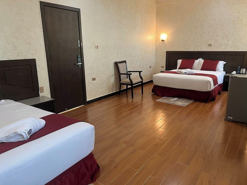 Standard Triple Family room with balcony and with city view