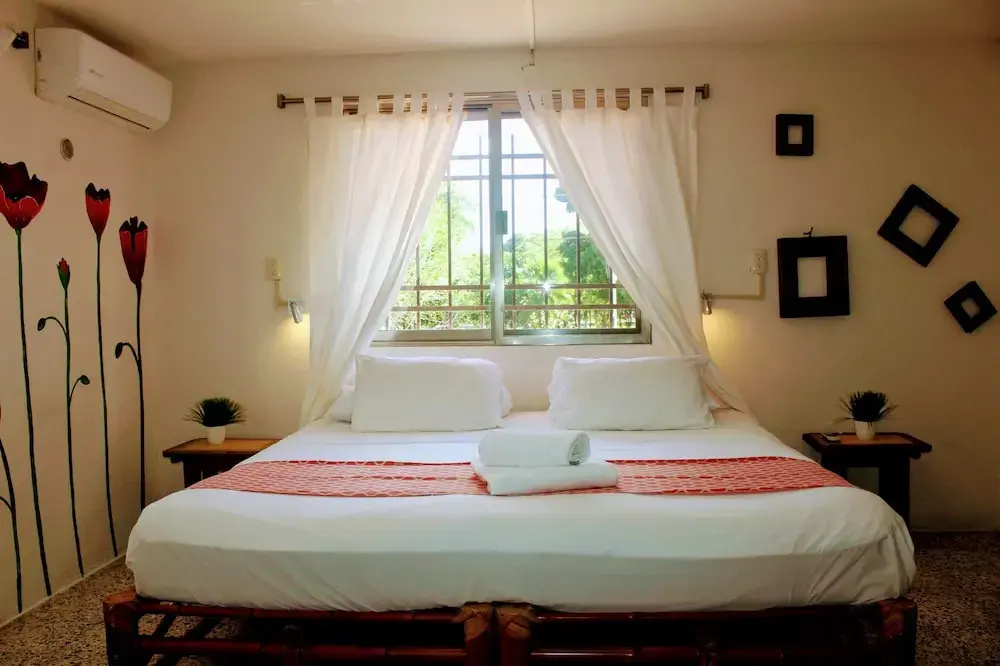 Hostal & Suites Pata de Perro - Chambres