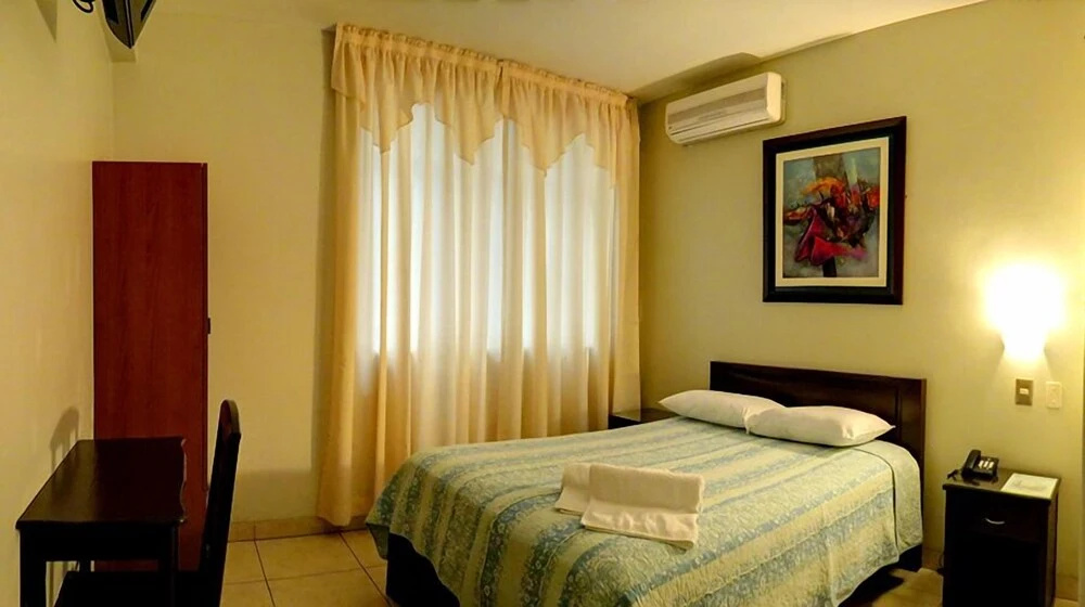 Rivera del Rio Hotel - Chambres