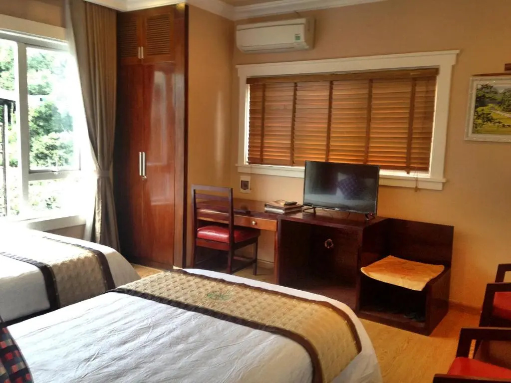 Hong Ky Boutique Hotel - Chambres