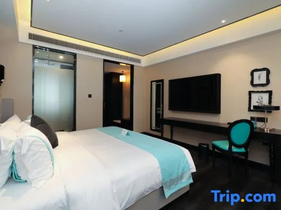 Xinliyuan Hotel - Chambres