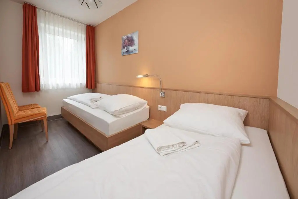 Hotel Touristik - Chambres