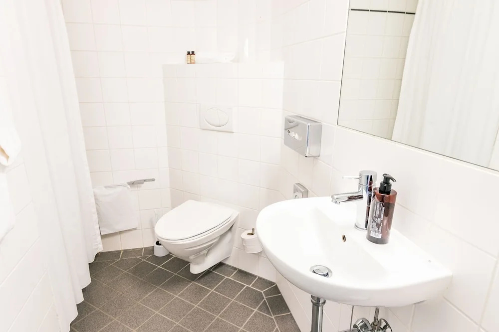 Sixtus Sinatur Hotel og Konference - Chambres