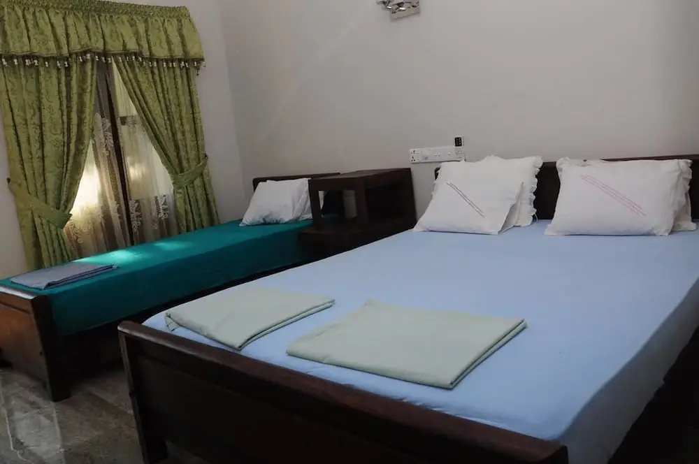 Traveller's Home Hotel - Chambres