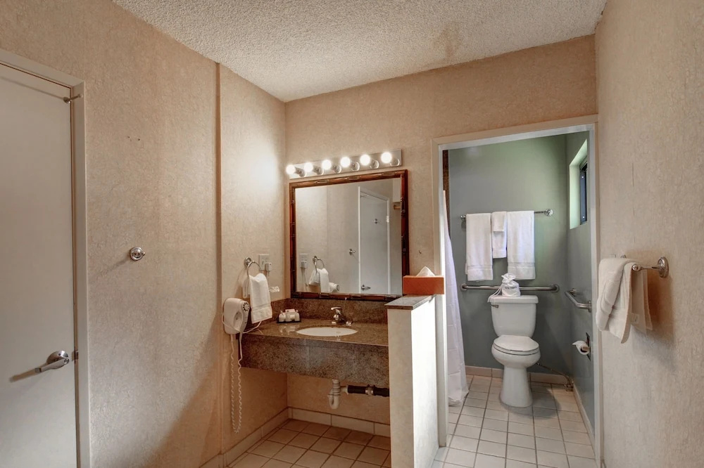 Caliente Tropics Hotel - Chambres