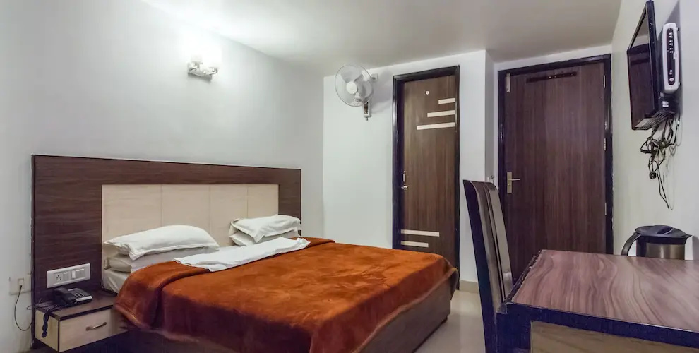 HKJ Residency - Chambres
