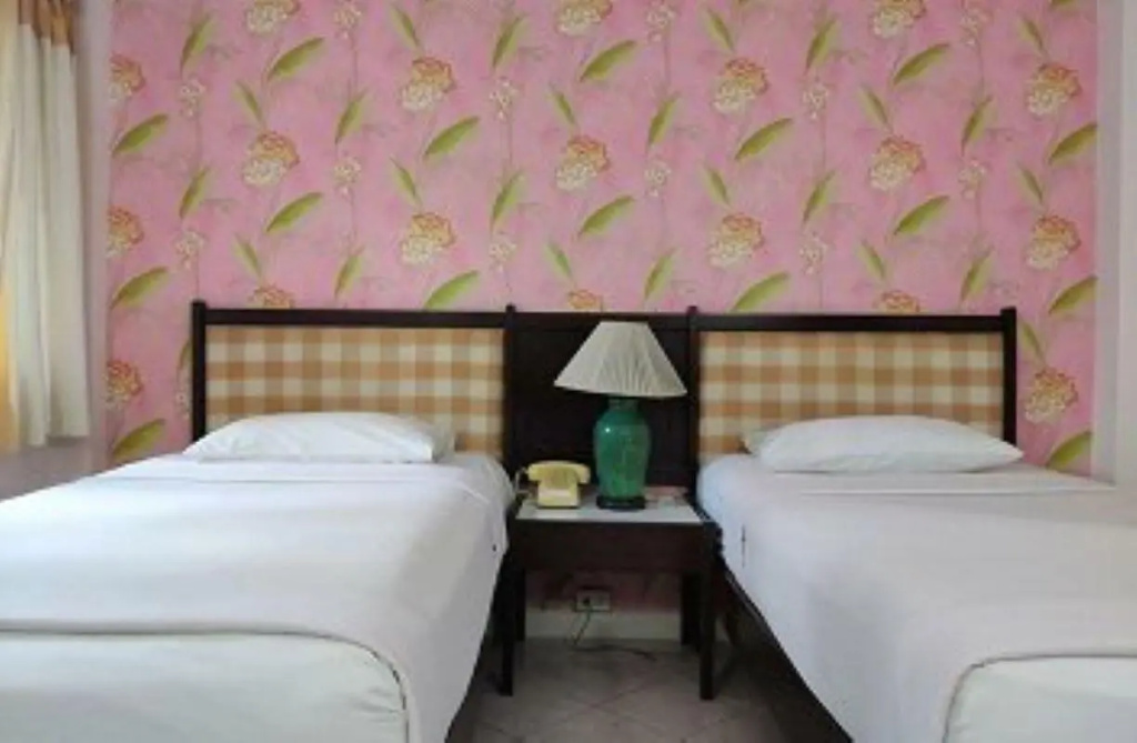 Changpuak Hotel - Chambres