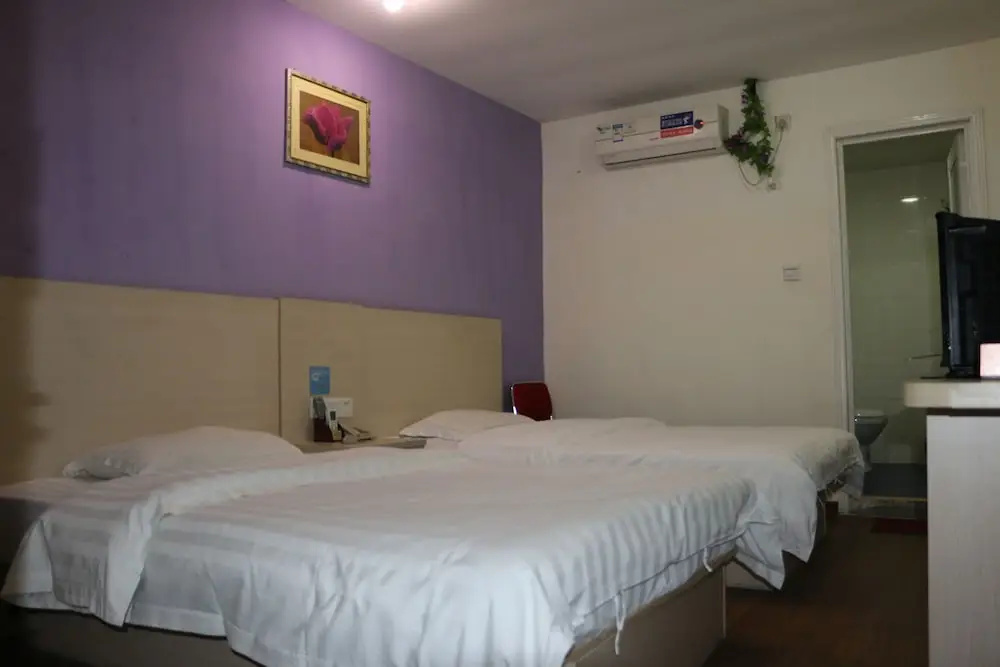 Yixin Business Hotel - Chambres