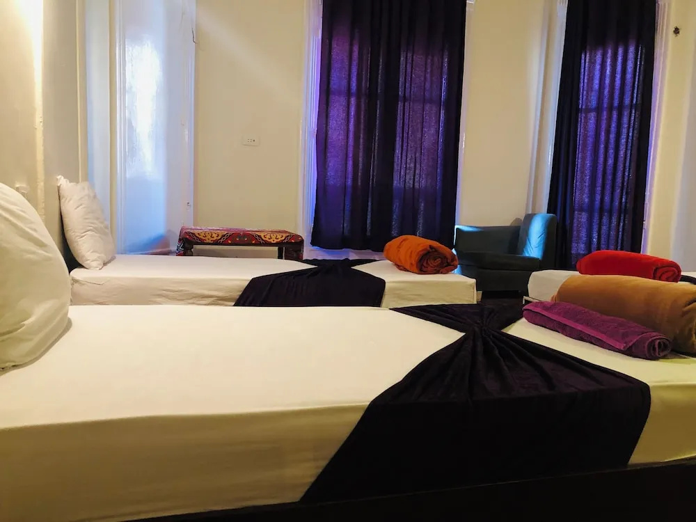 Deluxe Quadruple room with balcony