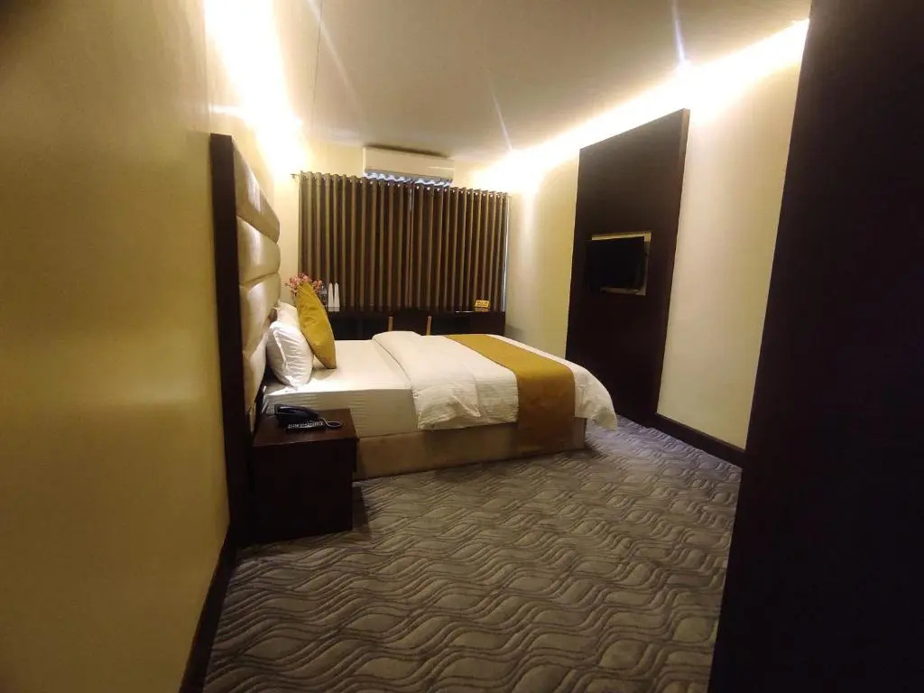 Richmond Hotel & Apartments - Chambres