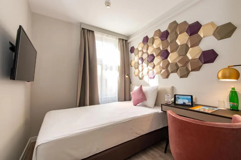 Three Corners Hotel Art - Chambres