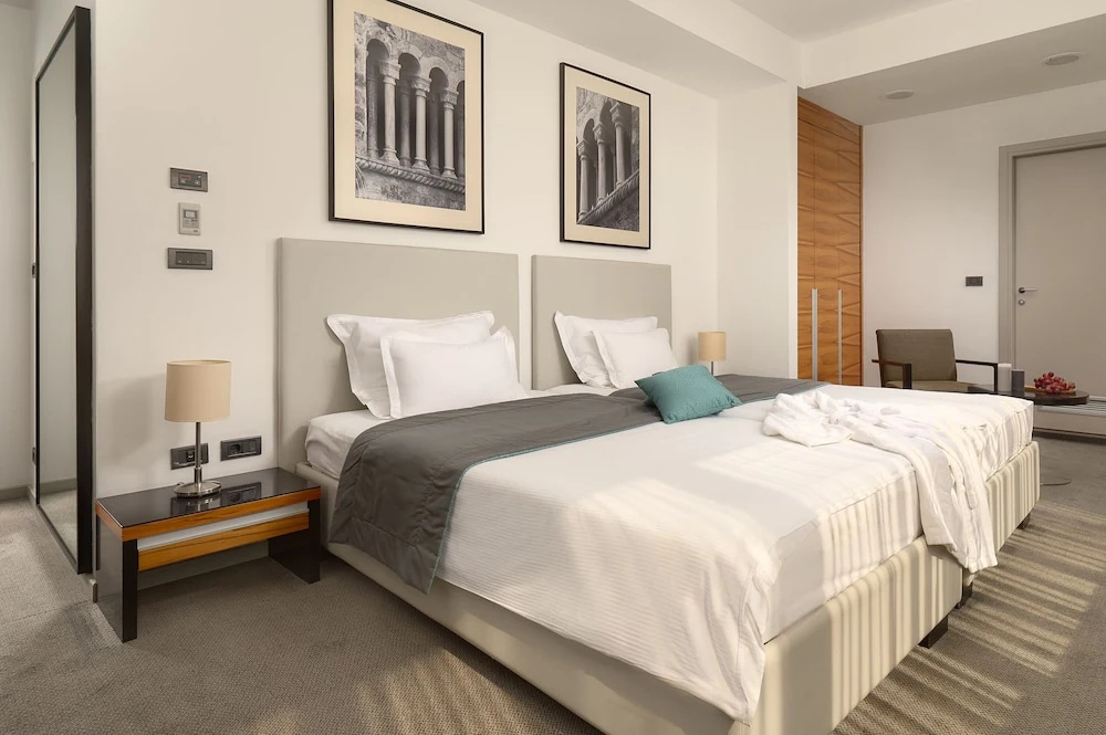 Atrium Hotel - Chambres