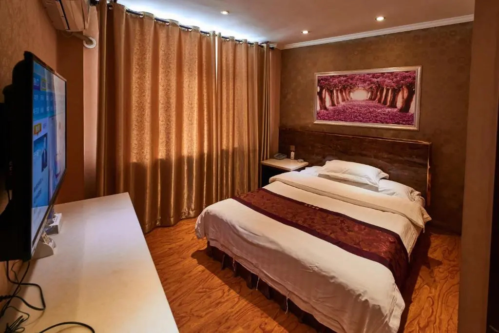 Zhangye Liangmao Hotel - Chambres