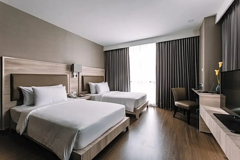 Adelphi Suites Bangkok - Chambres