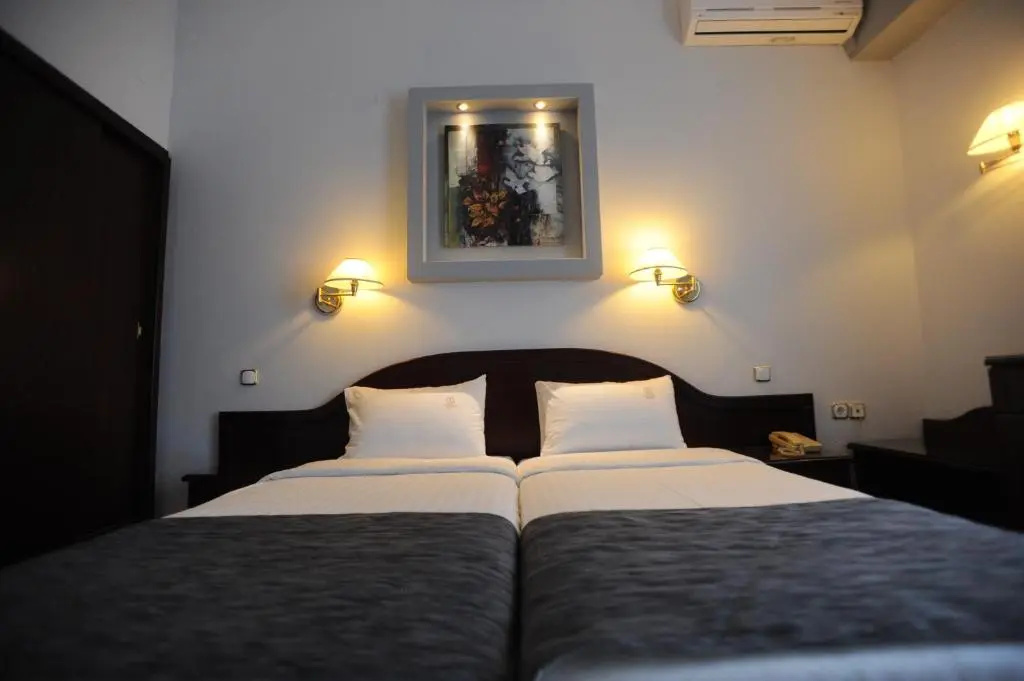 Lingos Hotel - Chambres