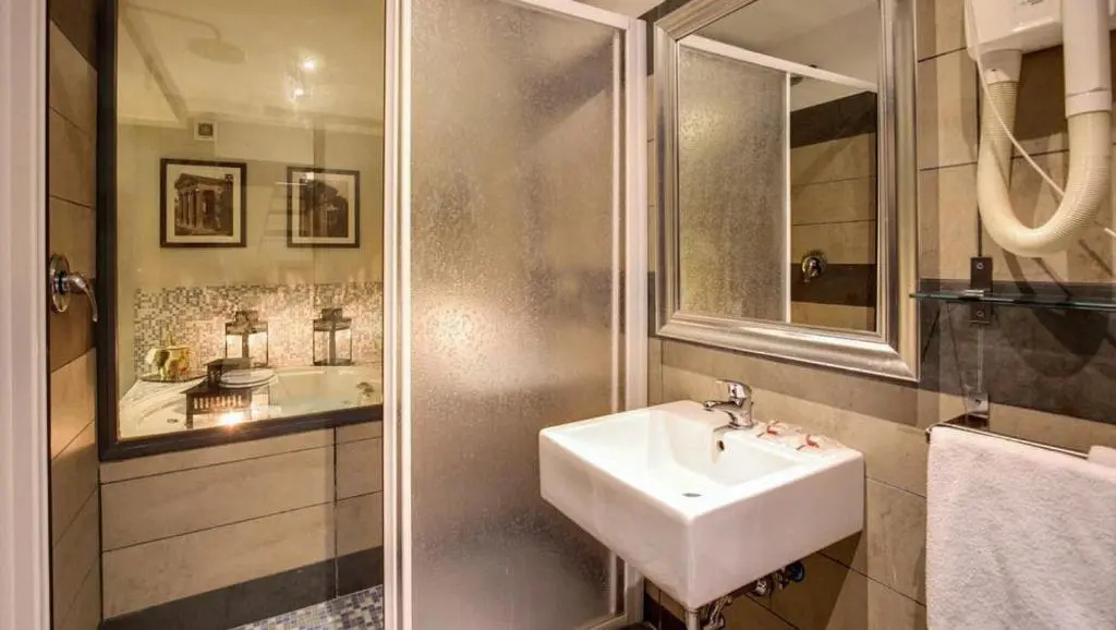 The Strand Hotel - Chambres