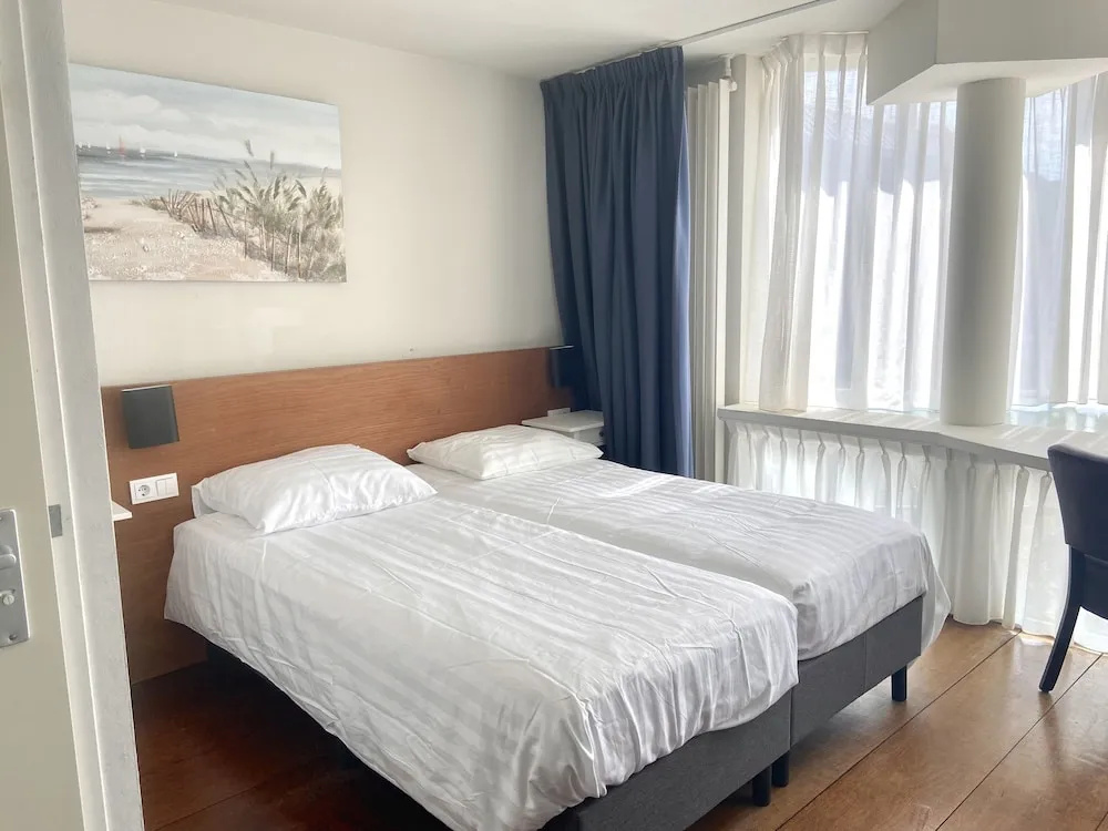 Comfort Quadruple room with balcony and with garden view