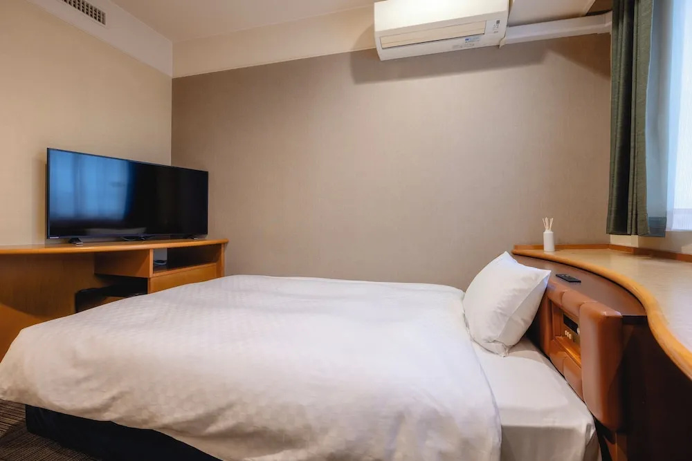 Kanku Izumiotsu Washington Hotel - Chambres