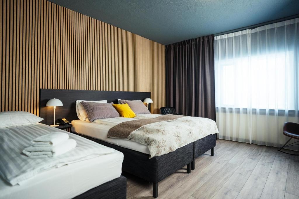 Konvin Hotel - Chambres
