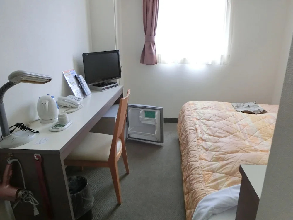 Orange Inn Sendaihigashi - Chambres