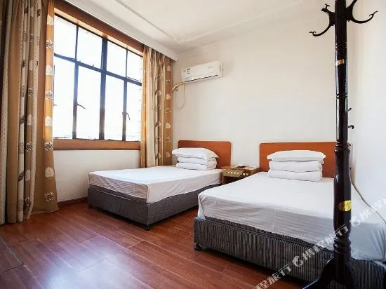 Hualong Hostel (Shanghai Zhelin)