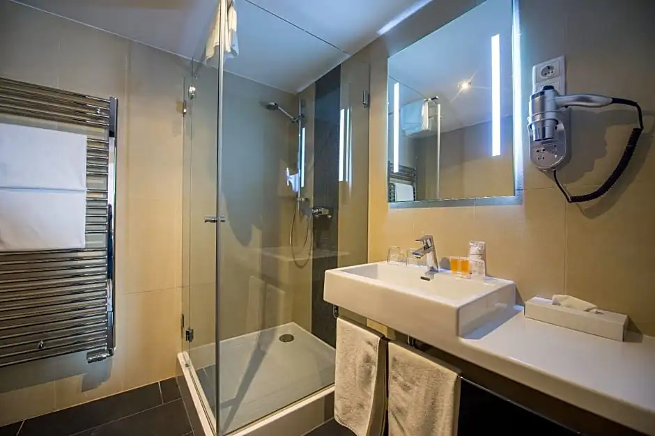 Three Corners Hotel Art - Chambres