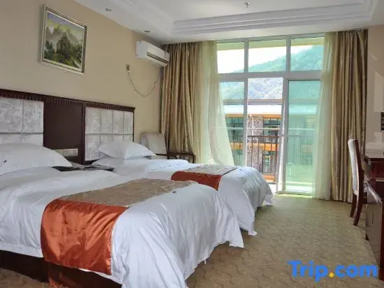 Wolong International Hotel - Chambres