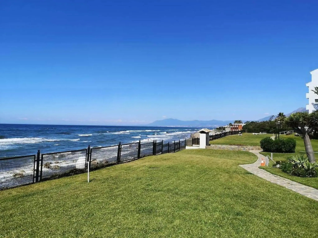 Modern apartment with pool on the beachfront in Marbella by SharingCo