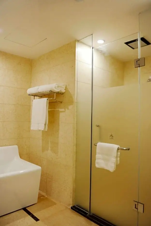 Pullman Qingdao Ziyue - Chambres
