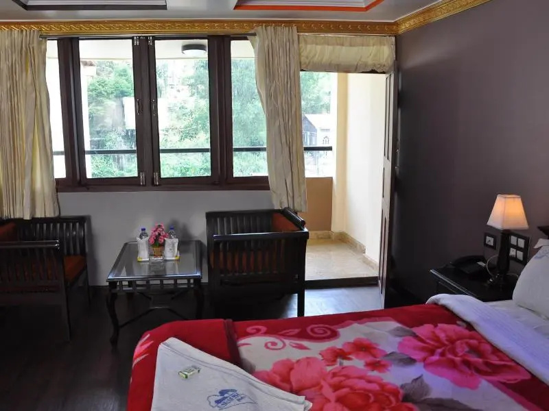 Hotel Grand Paradise Inn - Chambres
