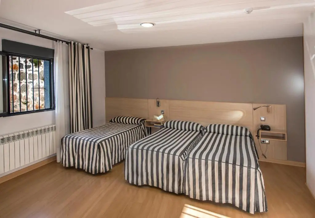 Hotel Puerta de la Santa - Chambres