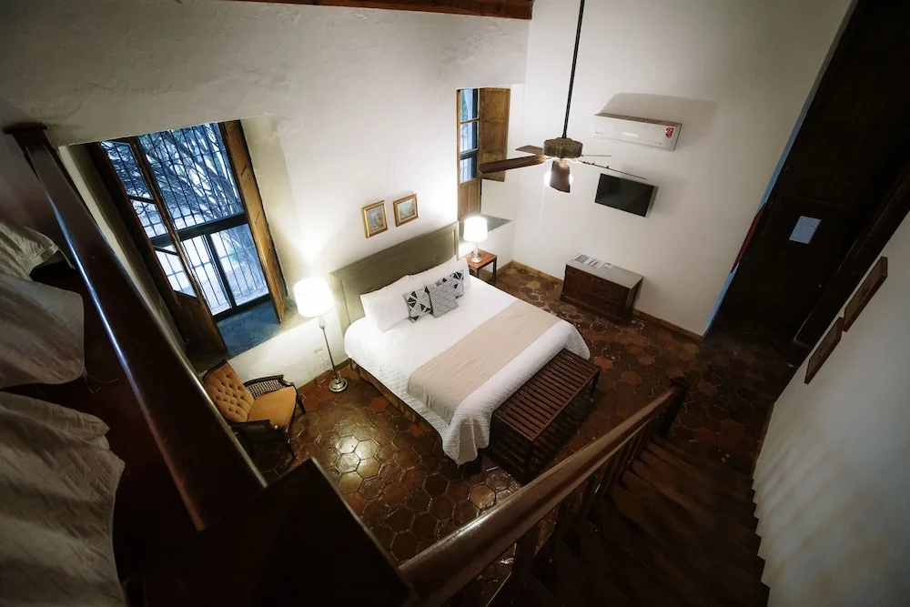 Hotel Hostal El Farol - Chambres