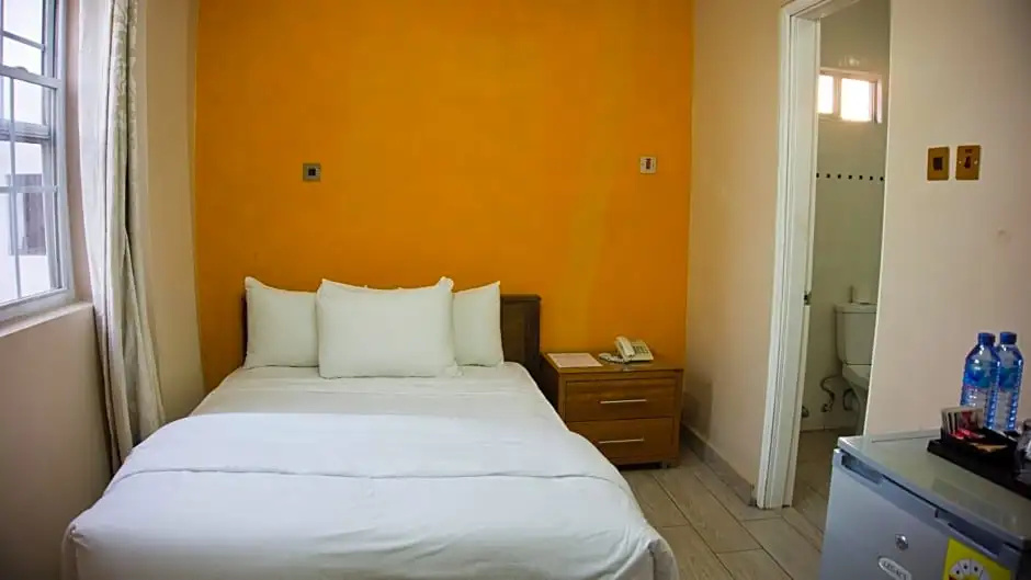 Tropical Enclave Hotel - Chambres