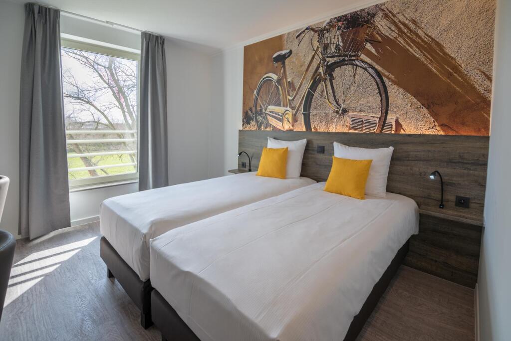 Двухместный номер Comfort 2 отдельные кровати в Velotel Brugge