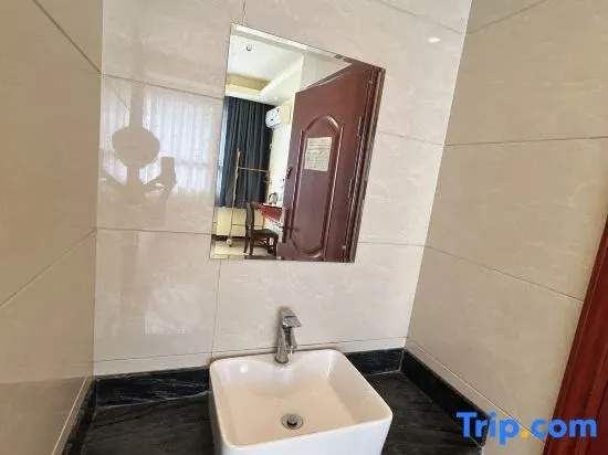 Huajun Hotel - Chambres