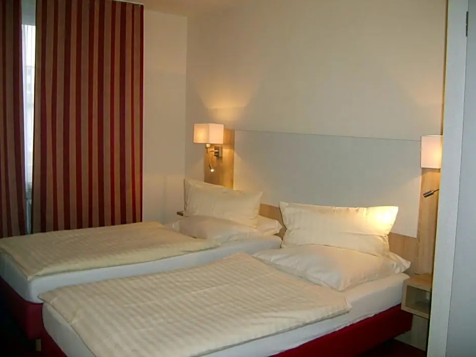 City Hotel by Celina - Chambres