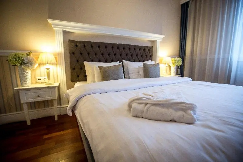 Queen's Court Hotel & Residence - Chambres