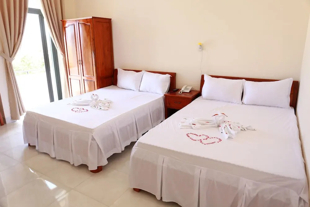 Lien Thong Hotel - Chambres