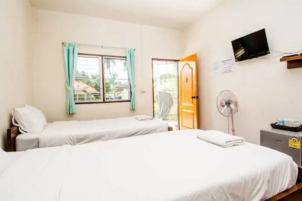 Sarm Mork Guesthouse - Chambres