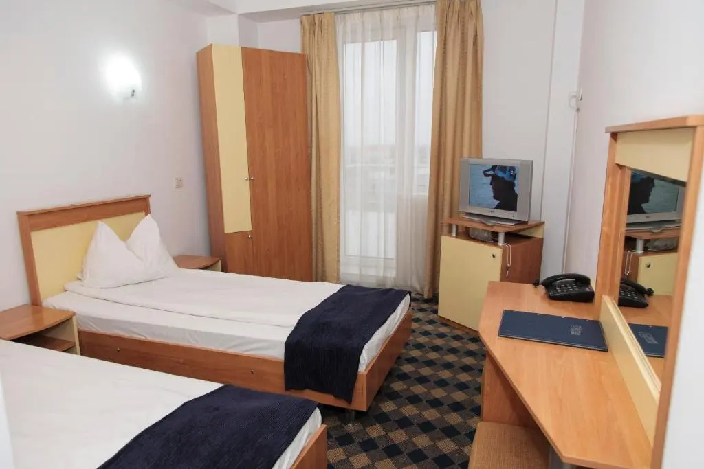 Plus Hotel - Chambres
