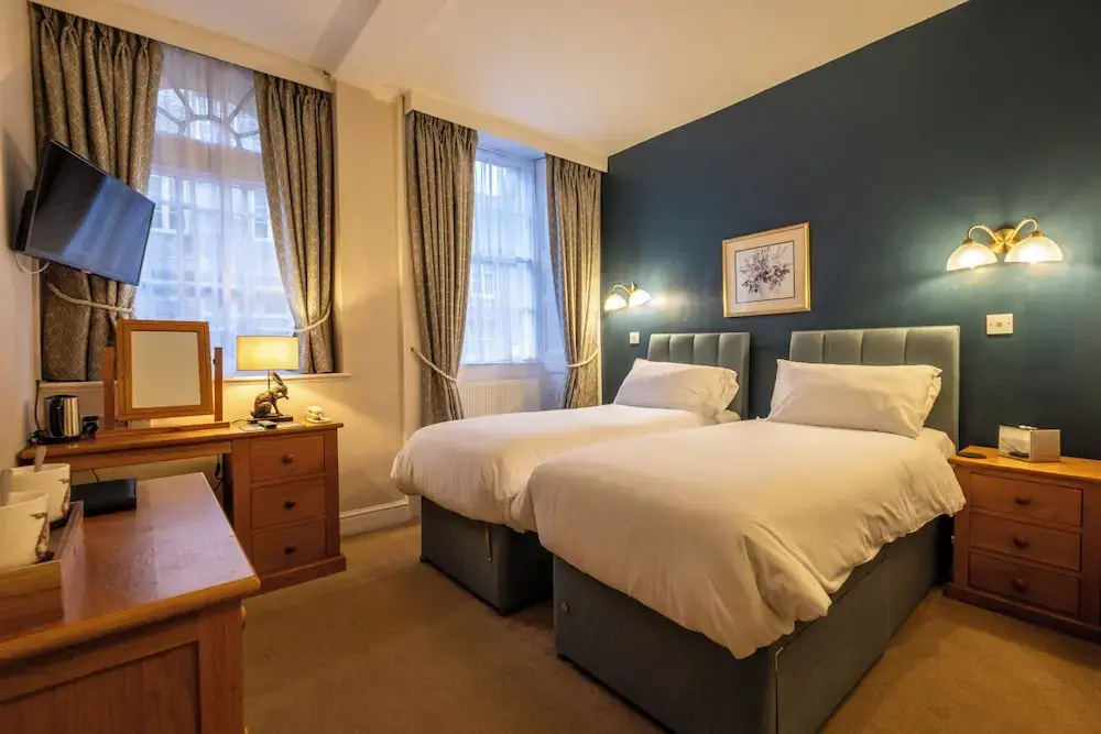 Corinium Hotel & Restaurant - Chambres