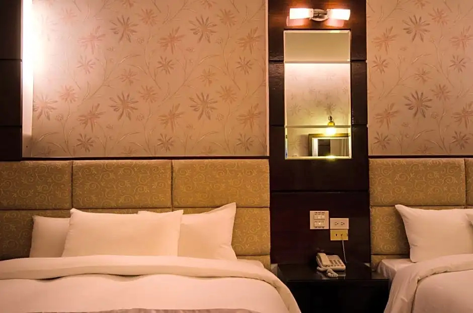 Wogo Hotel - Chambres