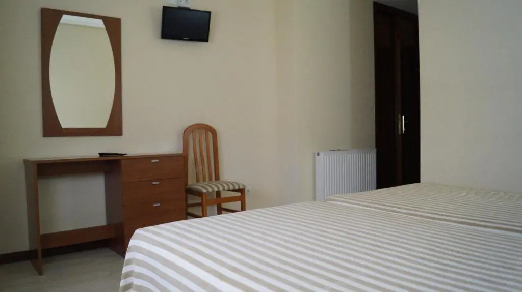 Hostal A Camelia - Chambres
