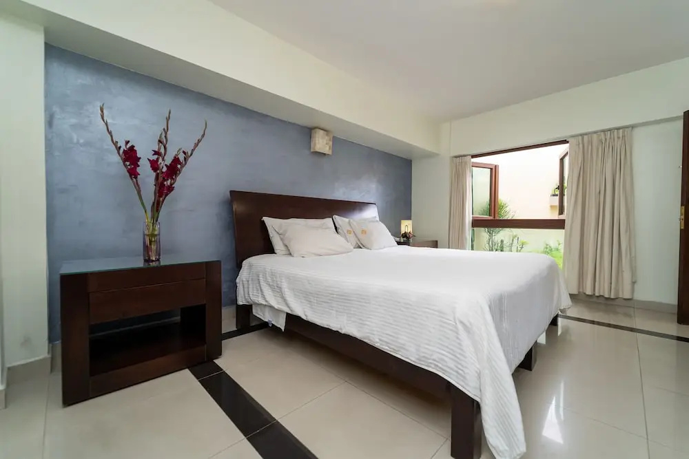 Casa de las Flores Hotel - Chambres